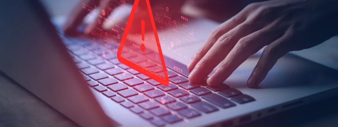 laptop-with-warning-triangle-for-hacked laptop-with-warning-triangle-for-hacked